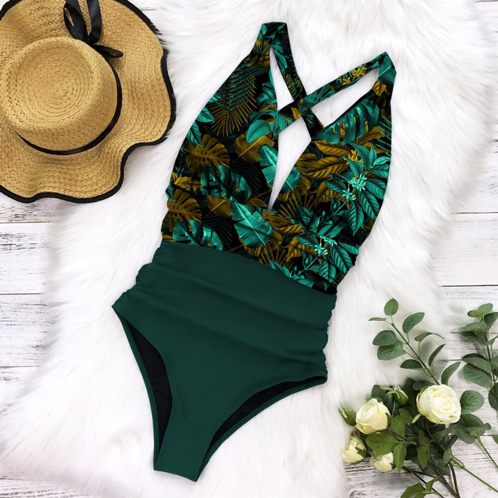 Grüner Badeanzug mit tropischem Muster, Damenmode, Sommer, Strandkleidung, elegant.