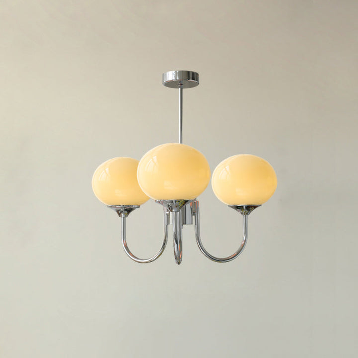 Modern pink and gold chandelier with elegant glass shades, ideal ceiling light fixture for chic home decor and illumination.